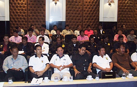 Representatives of jet ski businesses sit bored at the City Hall meeting, knowing that so far, they have nothing to fear as no one is doing anything but talking about their extortion scams.